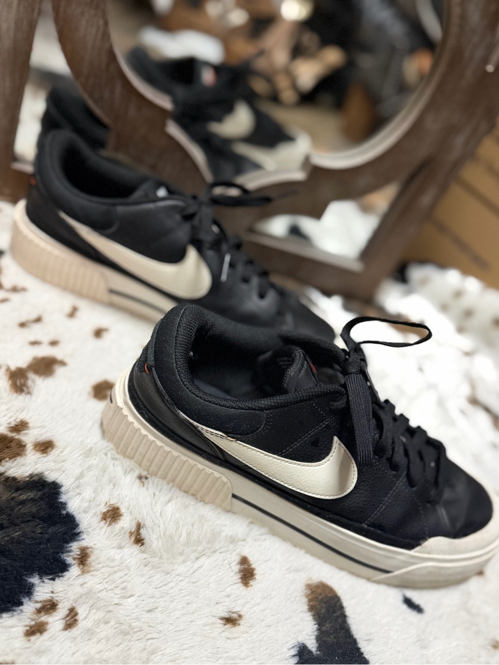 Nike Black Sneakers with Swoosh and White Sole